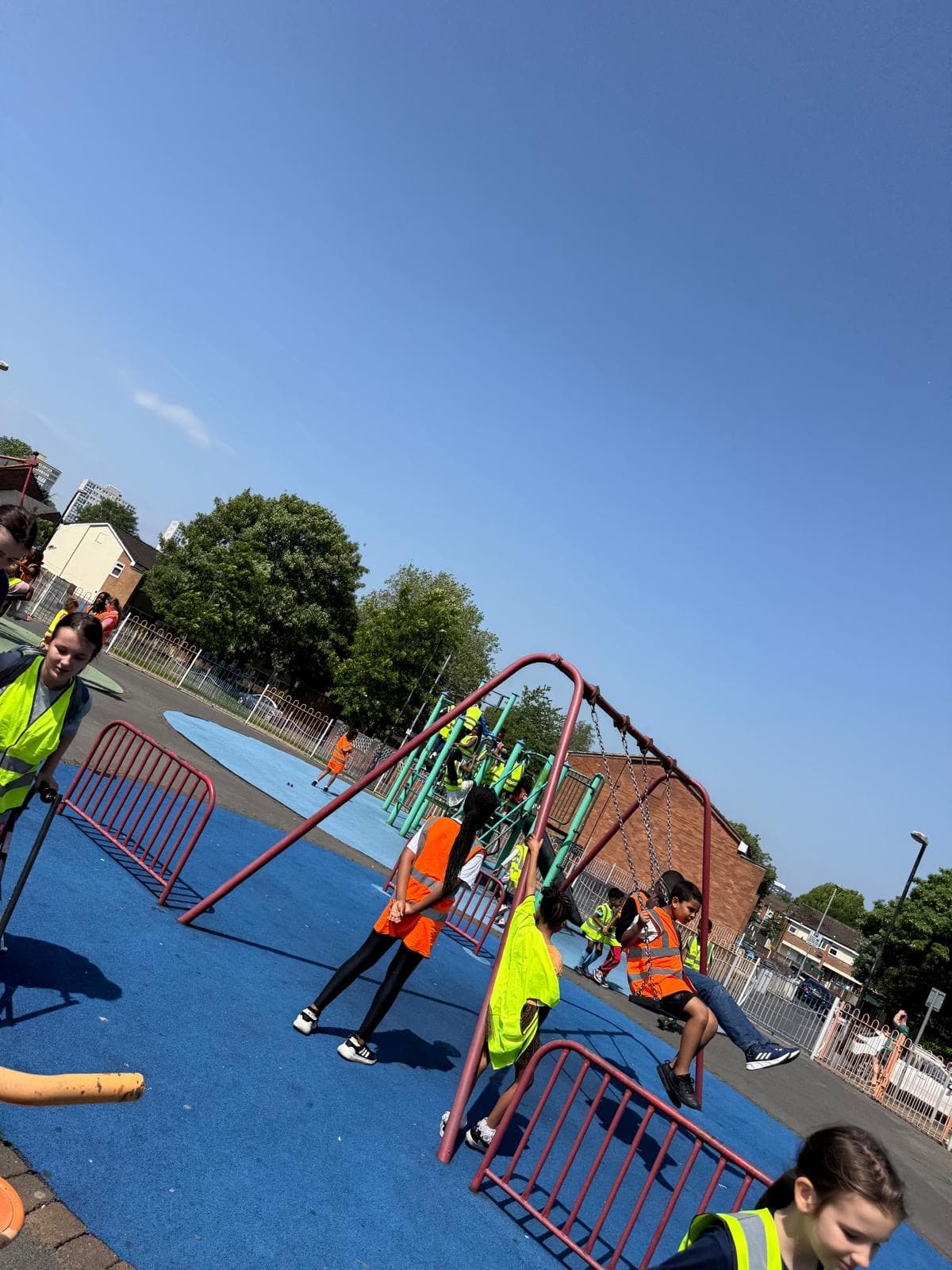 Children playing in the playground at Holiday Playscheme.