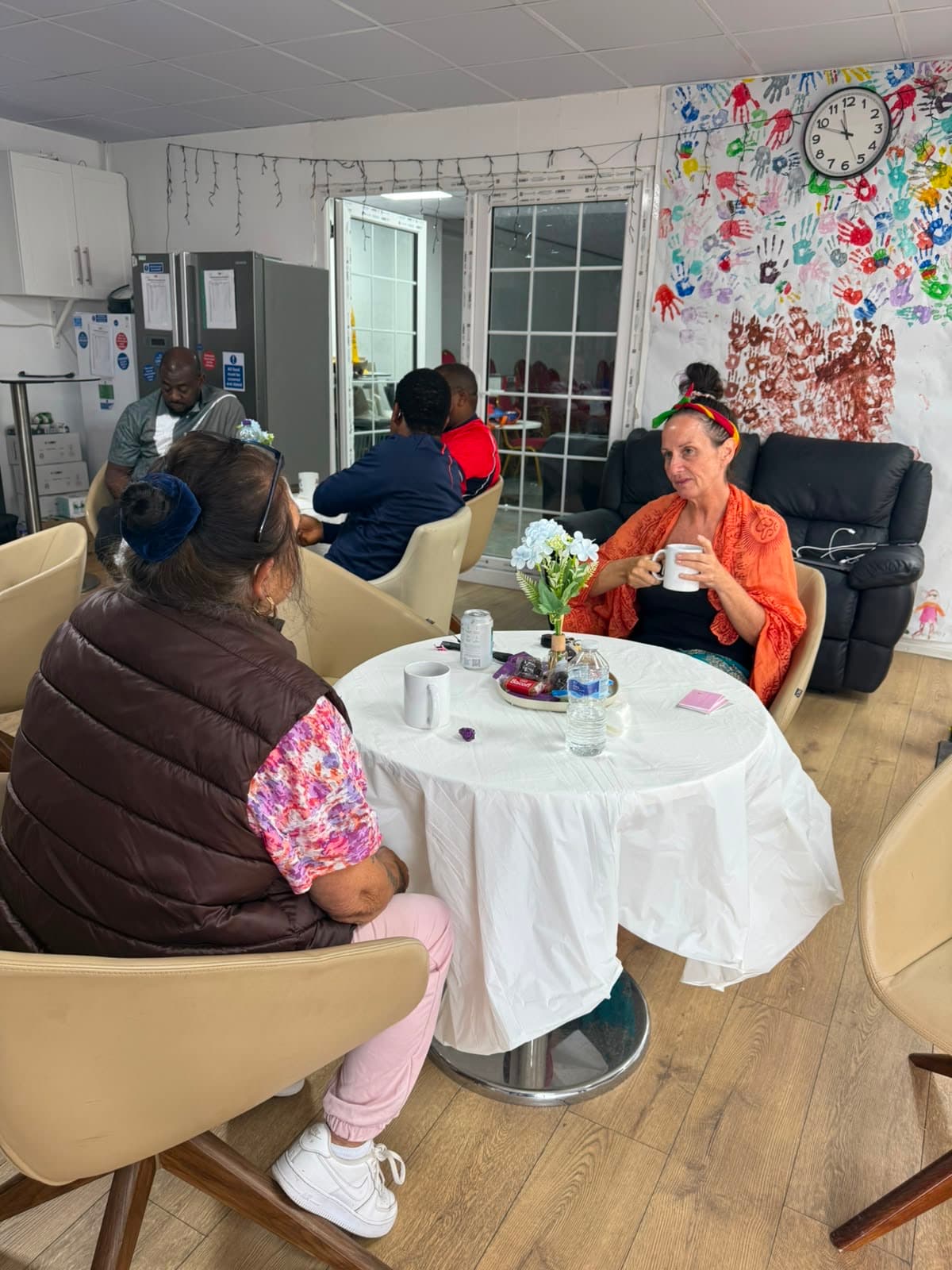 Sharing tea and conversation at Coffee Morning.